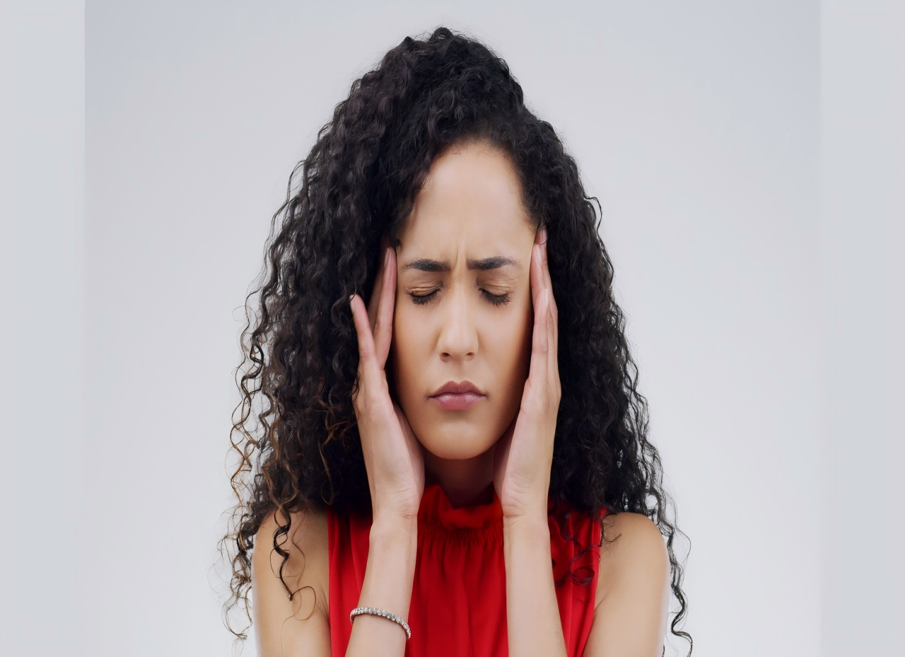 The headache is covering my ears.