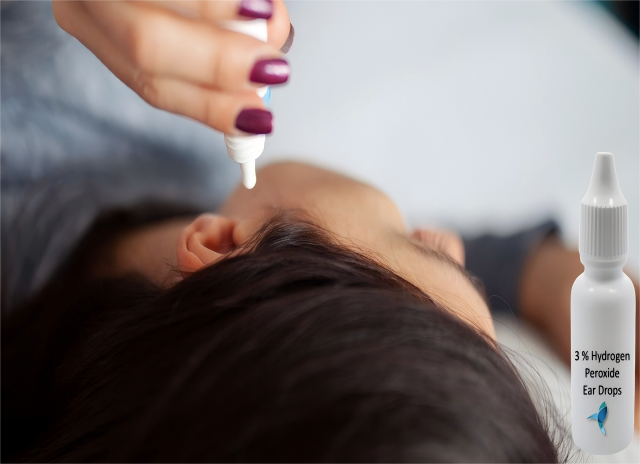 Hydrogen peroxide is dripping into the ear.