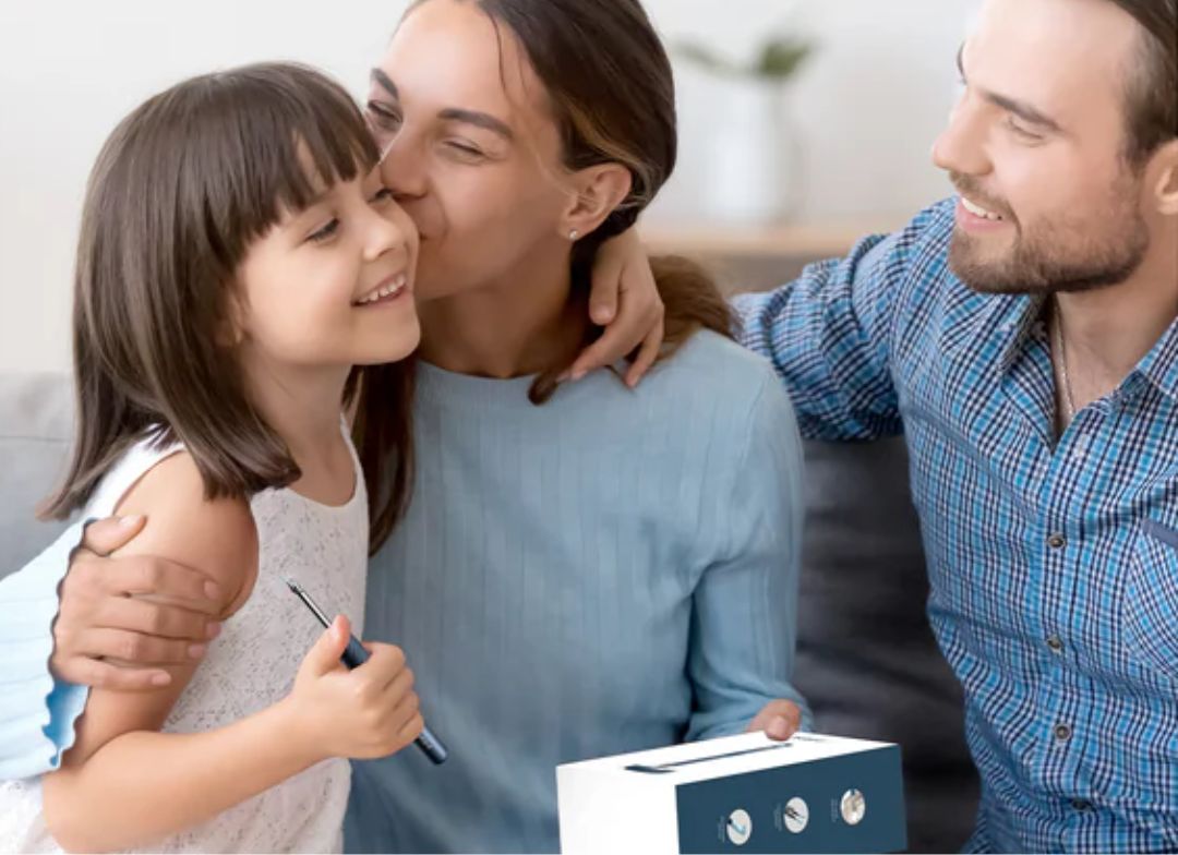 mother kissing daughter on cheek
